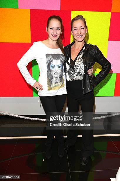 Lisa Seitz and her daughter Luzie Seitz during the 'Artists for kids' charity auction at Galerie Thomas Modern on December 8, 2016 in Munich, Germany.