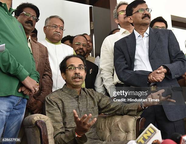 Shiv Sena leader Uddhav Thackeray with his party leaders during his press conference before meeting with Finance Minister on December 8, 2016 in New...