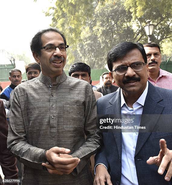 Shiv Sena leader Uddhav Thackeray with his party leaders during his press conference before meeting with Finance Minister on December 8, 2016 in New...