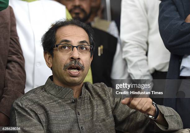 Shiv Sena leader Uddhav Thackeray with his party leaders during his press conference before meeting with Finance Minister on December 8, 2016 in New...