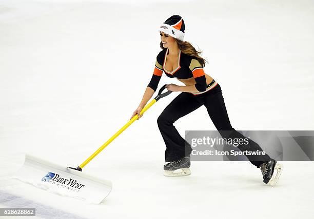 Anaheim Ducks power player in a Santa hat on the ice during a break in the action of the first period of a game against the Carolina Hurricanes, on...