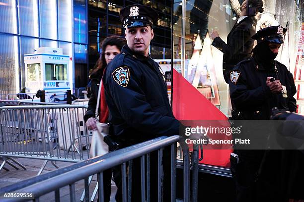 Police keep a heavy presence outside of Trump Tower on December 8, 2016 in New York City. New York City Mayor Bill de Blasio has requested $35...