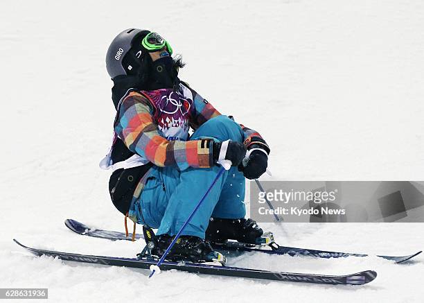 Russia - Manami Mitsuboshi of Japan reacts after falling in her second run of the women's ski halfpipe qualification round at the Rosa Khutor Extreme...