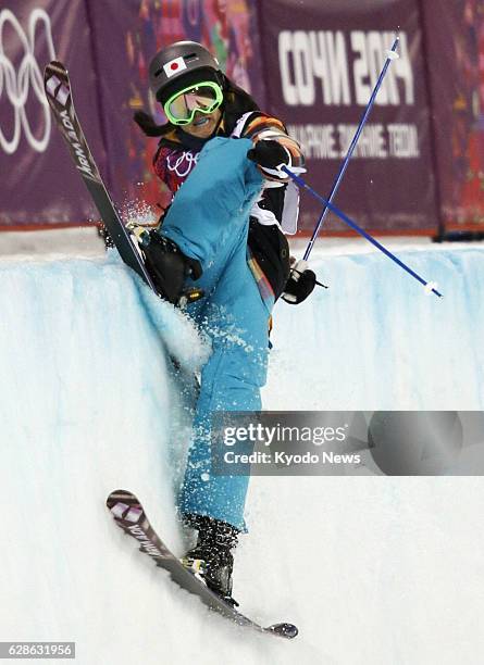 Russia - Manami Mitsuboshi of Japan loses balance during her first run in the women's ski halfpipe qualification round at the Rosa Khutor Extreme...