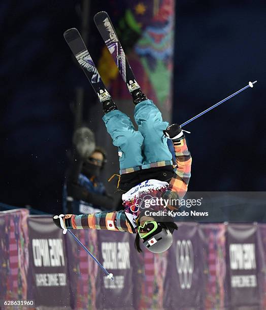 Russia - Manami Mitsuboshi performs during her first run in the women's ski halfpipe qualification round at the Rosa Khutor Extreme Park during the...