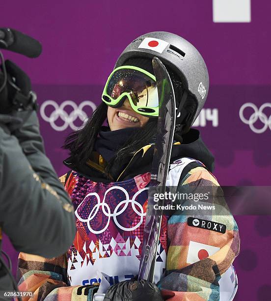 Russia - Manami Mitsuboshi of Japan finishes her first run in the women's ski halfpipe qualification round at the Rosa Khutor Extreme Park during the...