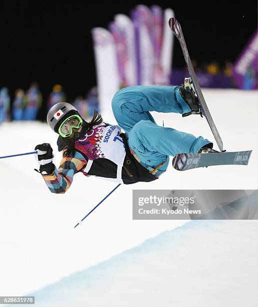 Russia - Manami Mitsuboshi of Japan loses balance while performing an aerial during her second run in the women's ski halfpipe qualification round at...