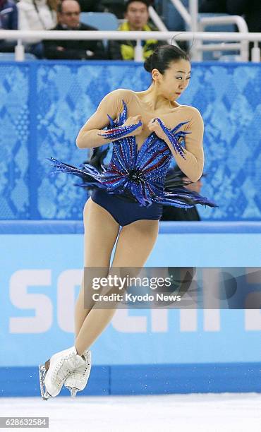 Russia - Japanese skater Mao Asada performs her triple axel during the free program of the women's figure skating event at the Winter Olympics at the...