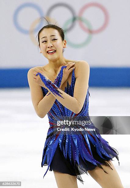 Russia - Mao Asada of Japan smiles after her performance in the free program of the women's figure skating competition at the Winter Olympics at the...