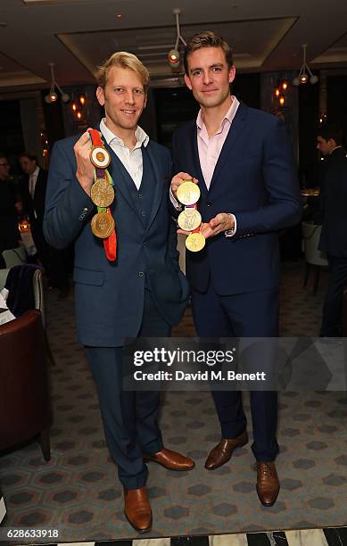 Andrew Triggs Hodge and Pete Reed attend OMEGA Constellation Globemaster dinner at Marcus on December 8, 2016 in London, England.