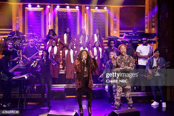 Episode 0587 -- Pictured: Musical guests Pharrell Williams and Kim Burrell perform on December 08, 2016 --