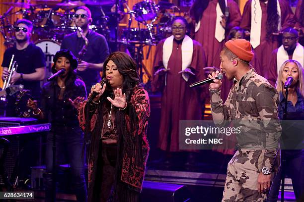 Episode 0587 -- Pictured: Musical guests Pharrell Williams and Kim Burrell perform on December 08, 2016 --