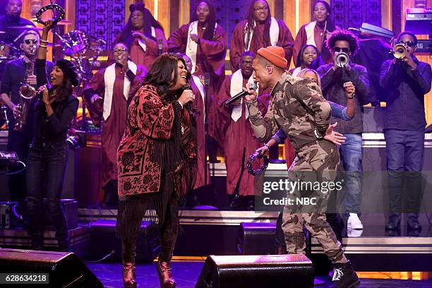 Episode 0587 -- Pictured: Musical guests Pharrell Williams and Kim Burrell perform on December 08, 2016 --