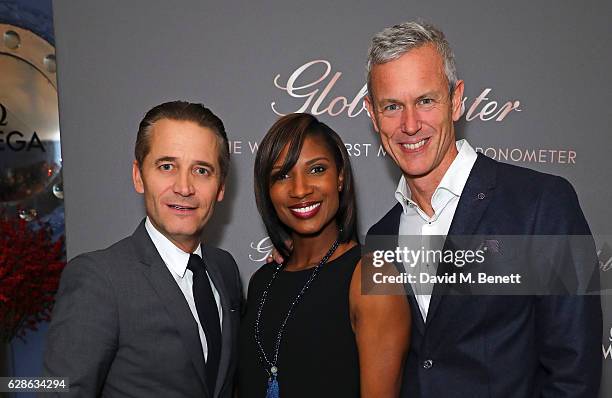 Raynald Aeschlimann, Denise Lewis and Mark Foster attend OMEGA Constellation Globemaster dinner at Marcus on December 8, 2016 in London, England.