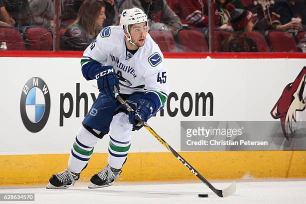 Michael Chaput of the Vancouver Canucks skates with the puck during the second period of the NHL game against the Arizona Coyotes at Gila River Arena...