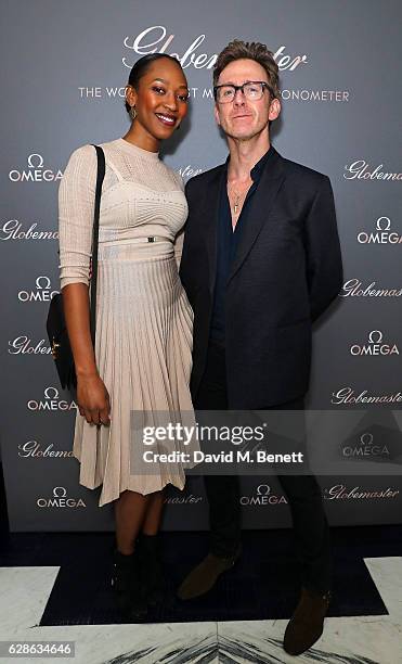 Vanessa Kingori and Tom Stubbs attend OMEGA Constellation Globemaster dinner at Marcus on December 8, 2016 in London, England.