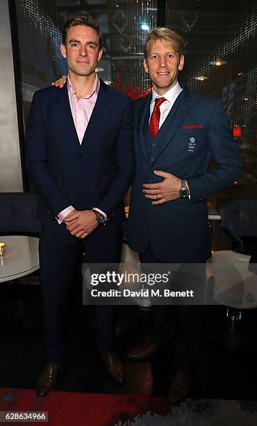 Pete Reed and Andrew Triggs Hodge attend OMEGA Constellation Globemaster dinner at Marcus on December 8, 2016 in London, England.
