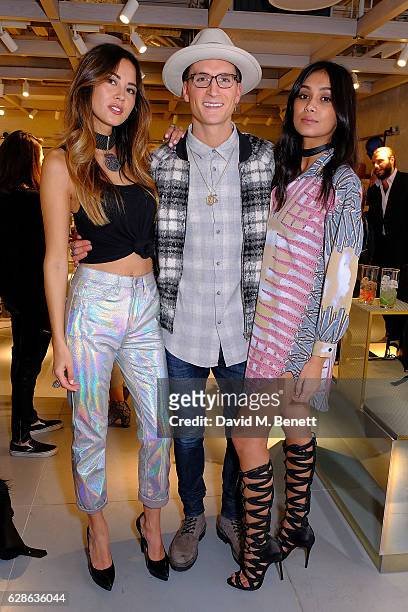 Ana Tanaka, Ollie Proudlock and a friend,attend as Taylor Morris Eyewear and The Morgan Motor Company present their first collaboration at Harvey...