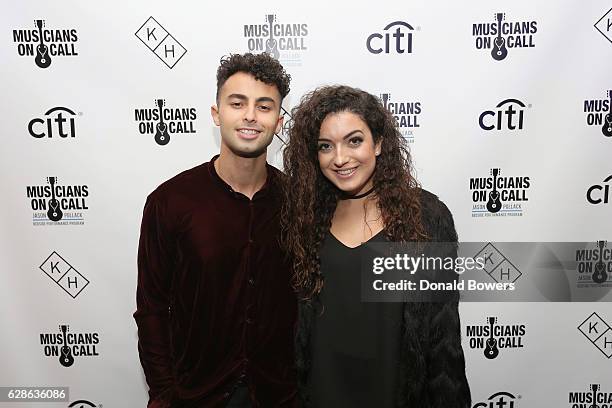 Singers Zach Matari and Nicky Costabile attend the Musicians On Call Deck The Halls Holiday Sweater Party at Kola House on December 8, 2016 in New...