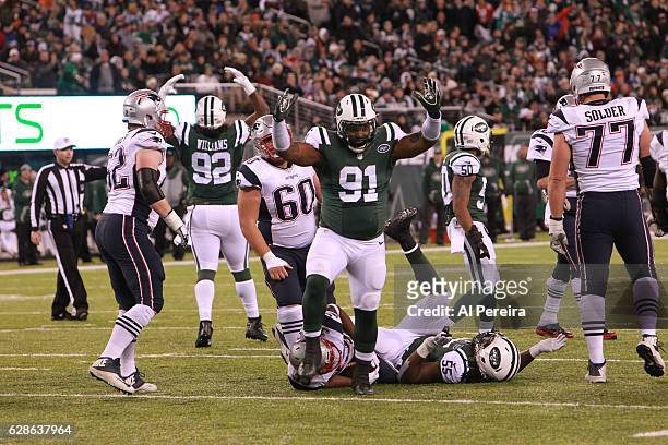 Defensive Lineman Sheldon Richardson of the New York Jets has a run stop against the New England Patriots on November 27, 2016 at MetLife Stadium in...