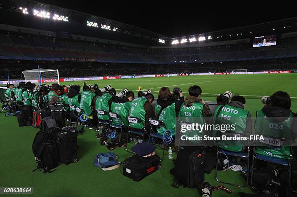 Photographers sitting behind the goal during the FIFA Club World Cup Play-off for Quarter Final match between Kashima Antlers and Auckland City at...