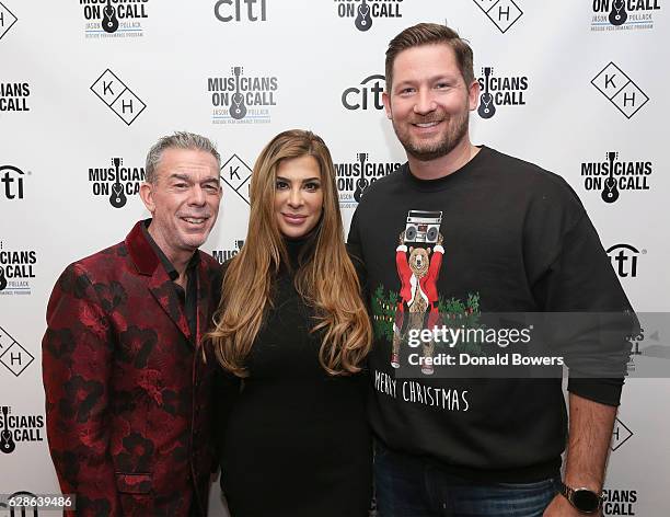 Personality Siggy Flicker, radio personality Elvis Duran, and President at Musicians On Call Pete Griffin attend the Musicians On Call Deck The Halls...