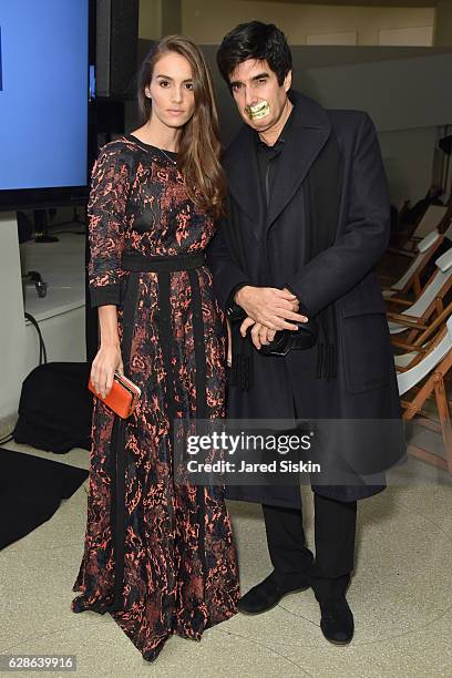 Chloe Gosselin and David Copperfield at MARINA 70 at Solomon R. Guggenheim Museum on December 8, 2016 in New York City.