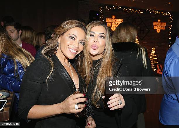 Personalities Dolores Catania and Siggy Flicker attend the Musicians On Call Deck The Halls Holiday Sweater Party at Kola House on December 8, 2016...