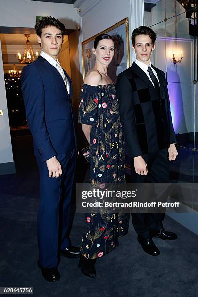 Choreographer Marie-Agnes Gillot standing between star dancers Hugo Marchand and Germain Louvet attend the Annual Charity Dinner hosted by the AEM...