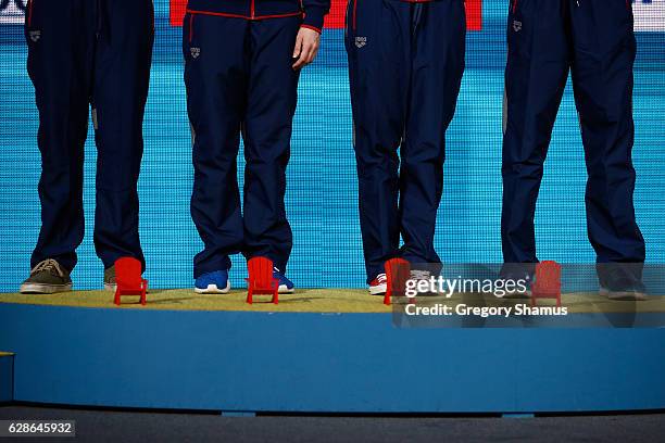 Team United States from left to right Tom Shields, Lilly King, Kelsi Worrell and Michael Chadwick receive their gold medal in the Mixed 4x50m Medley...