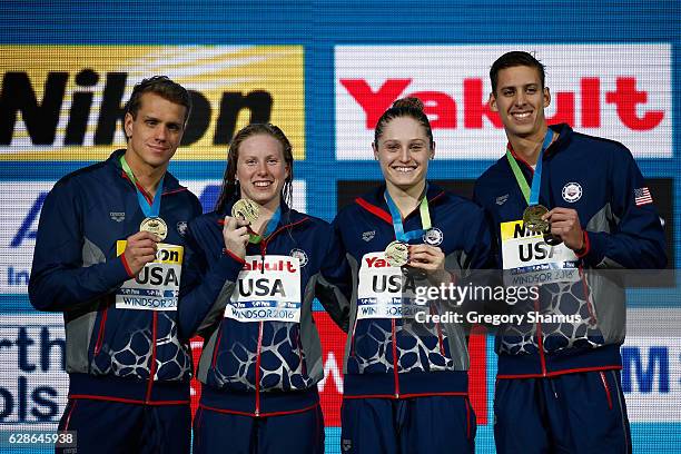 Team United States from left to right Tom Shields, Lilly King, Kelsi Worrell and Michael Chadwick celebrate their gold medal in the Mixed 4x50m...