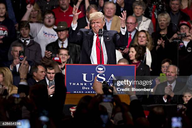 President-elect Donald Trump gestures during an event in Des Moines, Iowa, U.S., on Thursday, Dec. 8, 2016. Trump said China will soon have to "play...