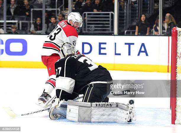 Derek Ryan of the Carolina Hurricanes scores on Jeff Zatkoff of the Los Angeles Kings to take a 1-0 lead during the first period at Staples Center on...