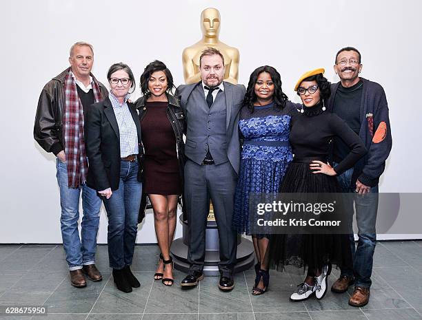 Kevin Costner, Donna Gigliotti, Taraji P. Henson, Ted Melfi, Octavia Spencer ,Janelle Monae and Wynn Thomas attend an official academy screening of...