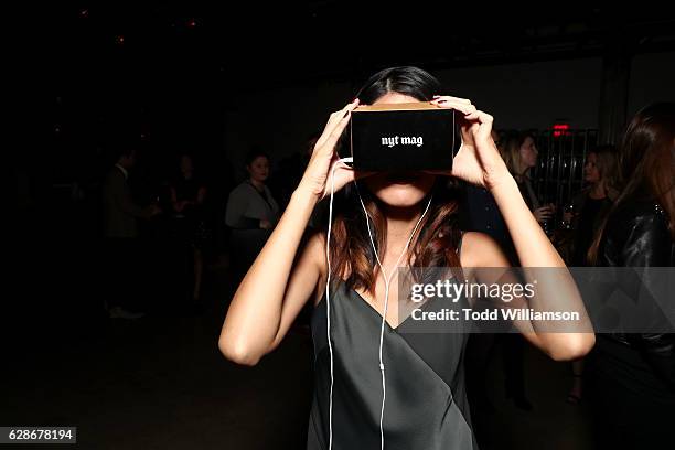 Guest enjoys the Great Performers VR experience using google cardboard during the New York Times Magazine's Great Performers 2016 at NeueHouse Los...