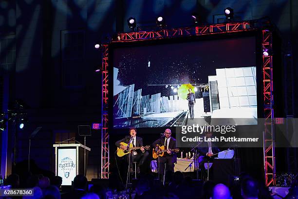 The band OK Go performs at the Smithsonian Magazine's 2016 American Ingenuity Awards after receiving an award for their groundbreaking, zero gravity...