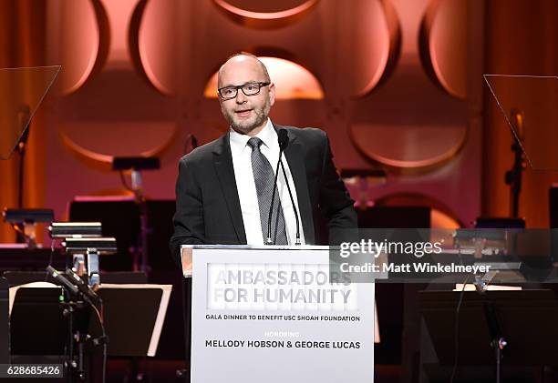 Shoah Foundation Executive Director Stephen Smith, PhD speaks onstage at the Ambassadors for Humanity Gala Benefiting USC Shoah Foundation at The Ray...