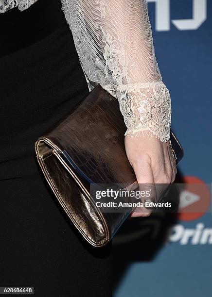 Actress Chelah Horsdal, clutch detail, arrives at the premiere of Amazon's "Man In The High Castle" Season 2 at the Pacific Design Center on December...