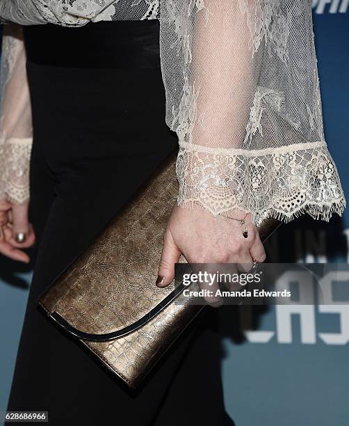 Actress Chelah Horsdal, clutch detail, arrives at the premiere of Amazon's "Man In The High Castle" Season 2 at the Pacific Design Center on December...