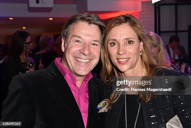 Patrick Lindner and Carin C. Tietze during the CONNECTIONS PR X-MAS Cocktail at Kaefer Atelier on December 8, 2016 in Munich, Germany.
