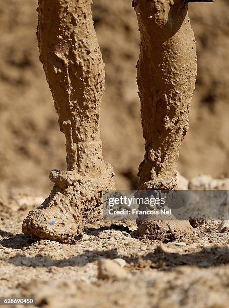 Participant tackles the Mud Mile during Tough Mudder Dubai at Hamdan Sports Complex on December 9, 2016 in Dubai, United Arab Emirates.