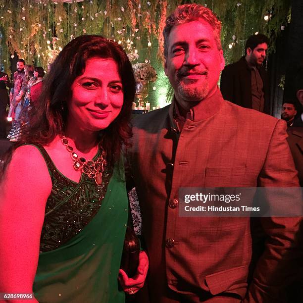 Former Indian cricketer Atul Wassan with his wife Sonu Wassan during the wedding reception of Indian Cricketer Yuvraj Singh and Bollywood actor Hazel...