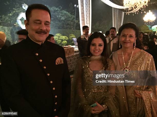 Sahara Group Chief Subrata Roy with his wife Swapna Roy and Cricketer MS Dhoni's wife Sakshi Dhoni during the wedding reception of Indian Cricketer...