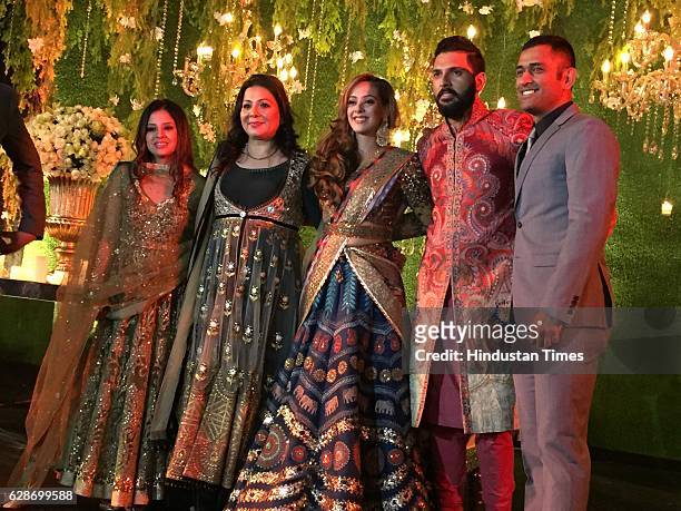 Indian Cricketer Yuvraj Singh with his wife and Bollywood actor Hazel Keech with Cricketer MS Dhoni and his wife Sakshi Dhoni during their wedding...