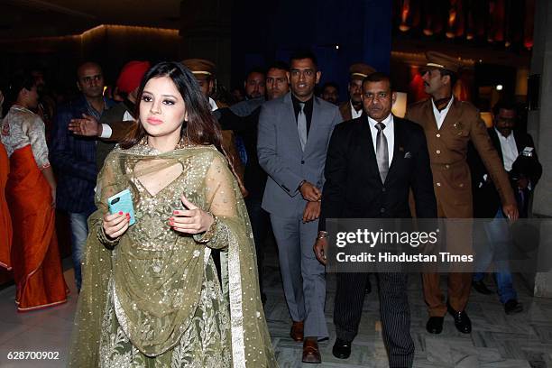 Indian Cricketer MS Dhoni with his wife Sakshi Dhoni during the wedding reception of Indian Cricketer Yuvraj Singh and Bollywood actor Hazel Keech,...