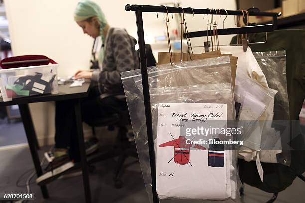 Machinist works on clothing samples in the workshop at the Rapha Racing Ltd. Headquarters office in London, U.K., on Thursday, Nov. 10, 2016. To keep...