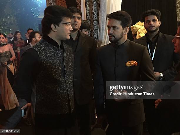 Former Indian cricketer Sourav Ganguly with BCCI President Anurag Thakur during the wedding reception of Indian Cricketer Yuvraj Singh and Bollywood...