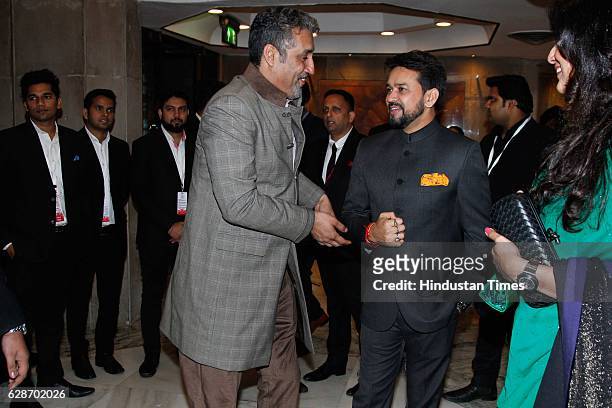 President Anurag Thakur with former Indian cricketer Atul Wassan during the wedding reception of Indian Cricketer Yuvraj Singh and Bollywood actor...