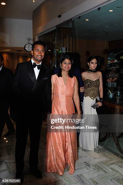 Indian Cricketer Pragyan Ojha with his wife Karabi Baral during the wedding reception of Indian Cricketer Yuvraj Singh and Bollywood actor Hazel...