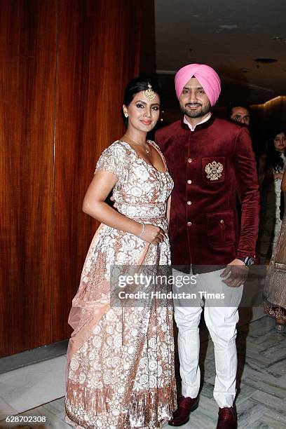 Indian Cricketer Harbhajan Singh with his wife and actor Geeta Basra during the wedding reception of Indian Cricketer Yuvraj Singh and Bollywood...